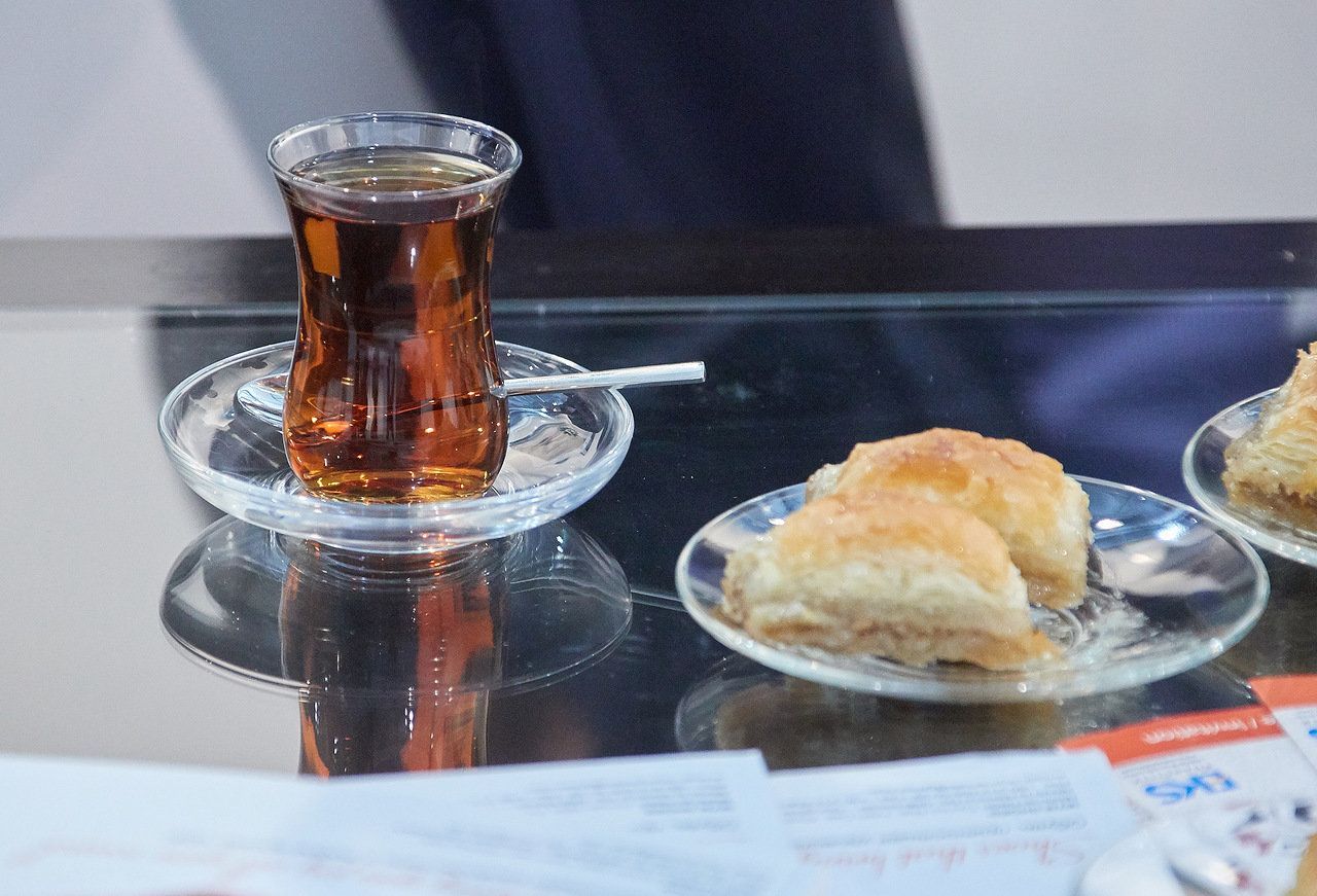 Turkish tea and baklava - catering of the national stand of Turkey at Euro Shoes Premiere Collection