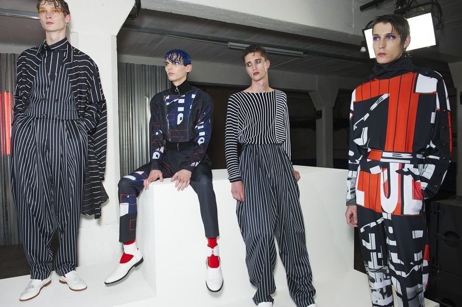 5 white shoe models on the London Fashion Men's Week catwalk