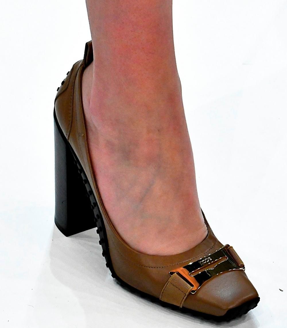 Leather material. Heel: steady. Decor: rivets + buckle