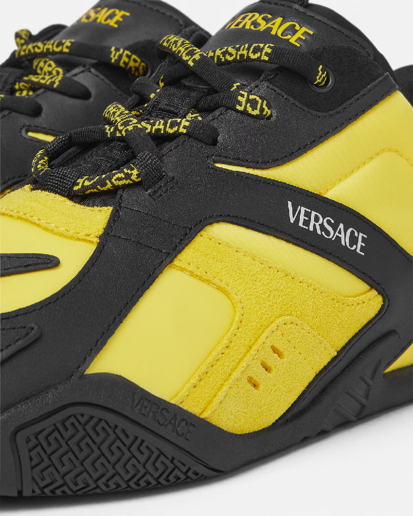 Prada Moves Cautiously Towards Versace Acquisition